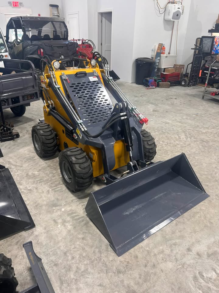 Our 24 HP two-pump wheeled mini skid steer